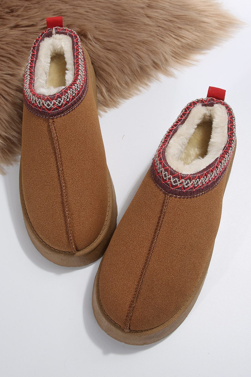 Chestnut Suede Contrast Print Plush Lined Snow Boots


		Step into comfort and style with its round-toe design and slip-on style
	
	
		Keep your feet warm during winter with the thermal plush-lined design
	
	
Shoes & BagsDalilly Designs BoutiqueChestnut Suede Contrast Print Plush Lined Snow Boots