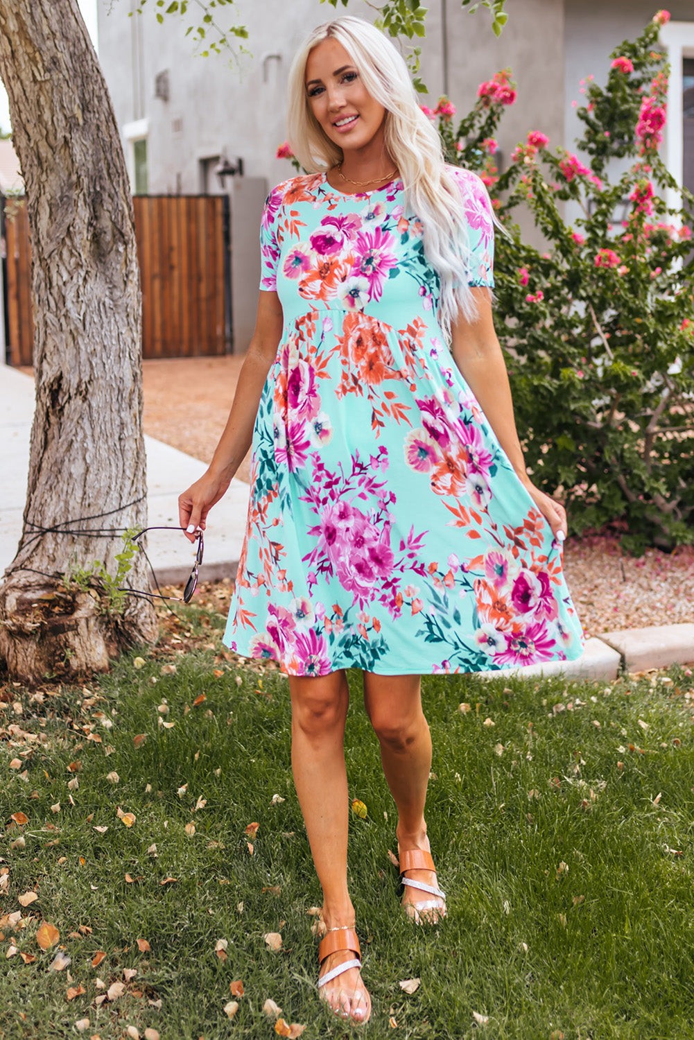 Sky Blue Short Sleeve High Waist Floral T-shirt Dress

		This short dress features a gorgeous floral print on a pretty blue background
	The babydoll body elongates and slims the waist
	Round neck, short sleeves, high DressesDalilly Designs BoutiqueSky Blue Short Sleeve High Waist Floral