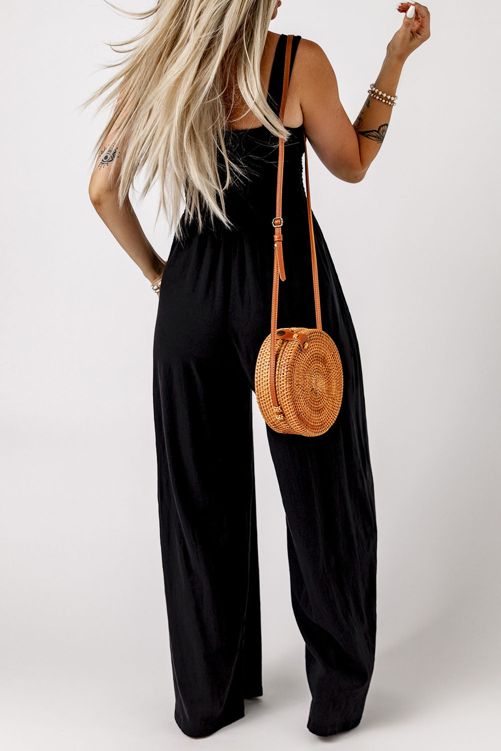 Black Smocked Sleeveless Wide Leg Jumpsuit with Pockets


		This shirred jumpsuit fits most body shapes with elasticity
	
	
		Featured with a square neckline, sleeveless, ruched waist, wide leg, and side pocket
	
BottomsDalilly Designs BoutiqueBlack Smocked Sleeveless Wide Leg Jumpsuit