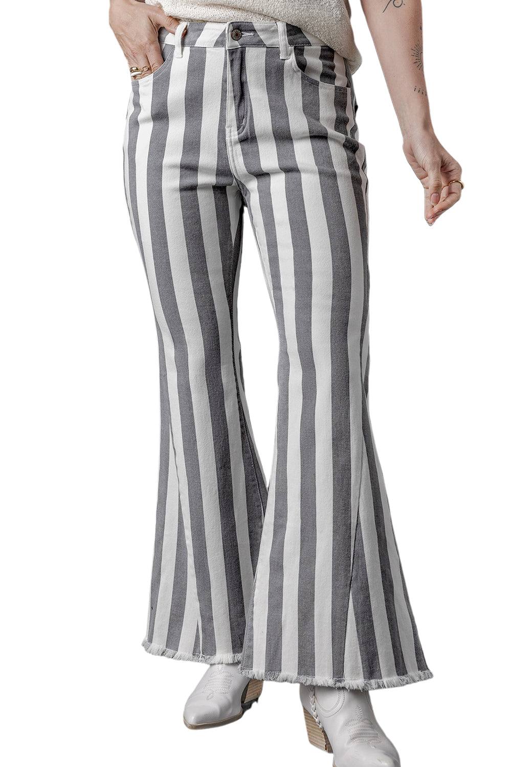 Stripe Star Embellished Western Flare Jeans

	


		These stylish flared jeans are versatile and eye-catching
	
	
		The high waistline makes your legs look longer
	
	
		The vertical stripe print creaBottomsDalilly Designs BoutiqueStripe Star Embellished Western Flare Jeans