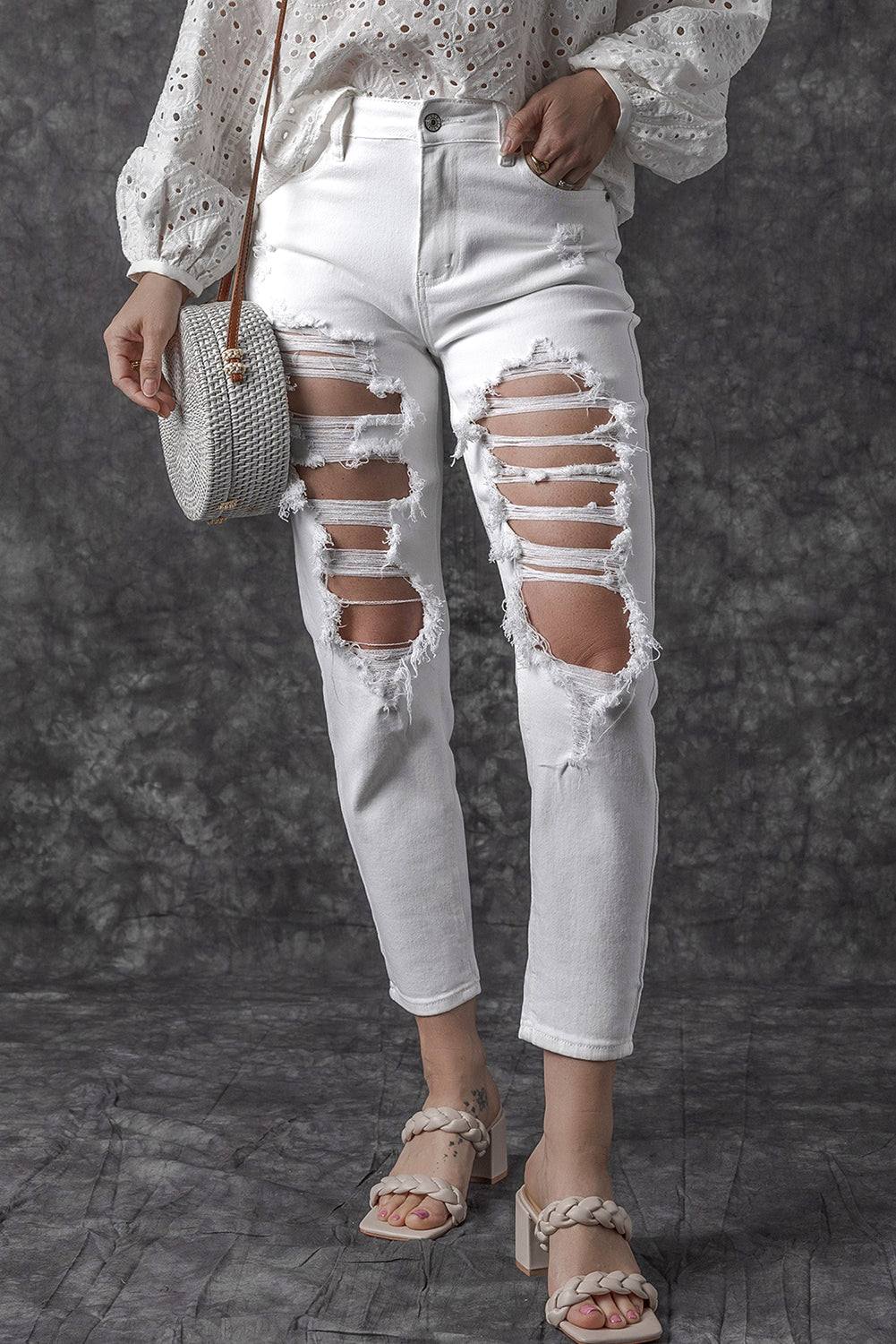 White Distressed Ripped Holes High Waist Skinny Jeans


		The boyfriend jeans are so cool and unique for women
	
	
		Distressed detailing for a trendy and edgy look
	
	
		Slim fit to accentuate your curves and BottomsDalilly Designs BoutiqueWhite Distressed Ripped Holes High Waist Skinny Jeans