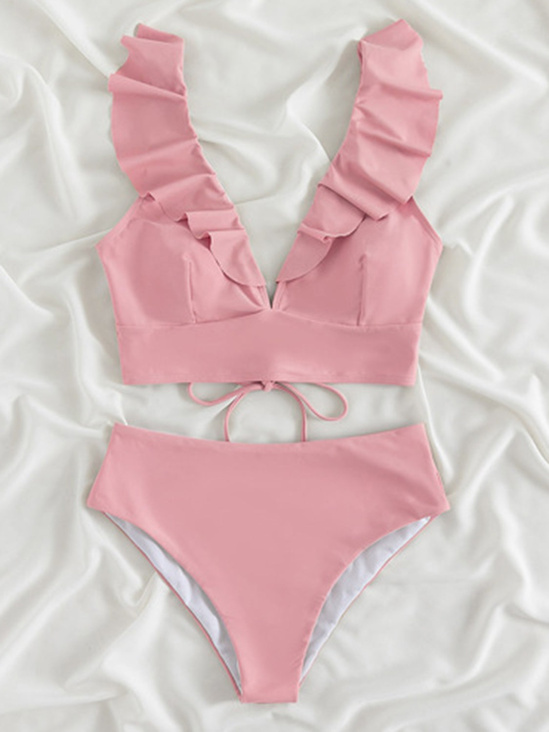 Ruffled V-Neck Sleeveless Two-Piece Swim Set
Features: Ruffled
Number of pieces: Two-piece
Chest pad: Removable padding
Underwire: No underwire
Stretch: Moderate stretch
Material composition: 80% polyamide, 200Dalilly Designs Boutique-Piece Swim Set