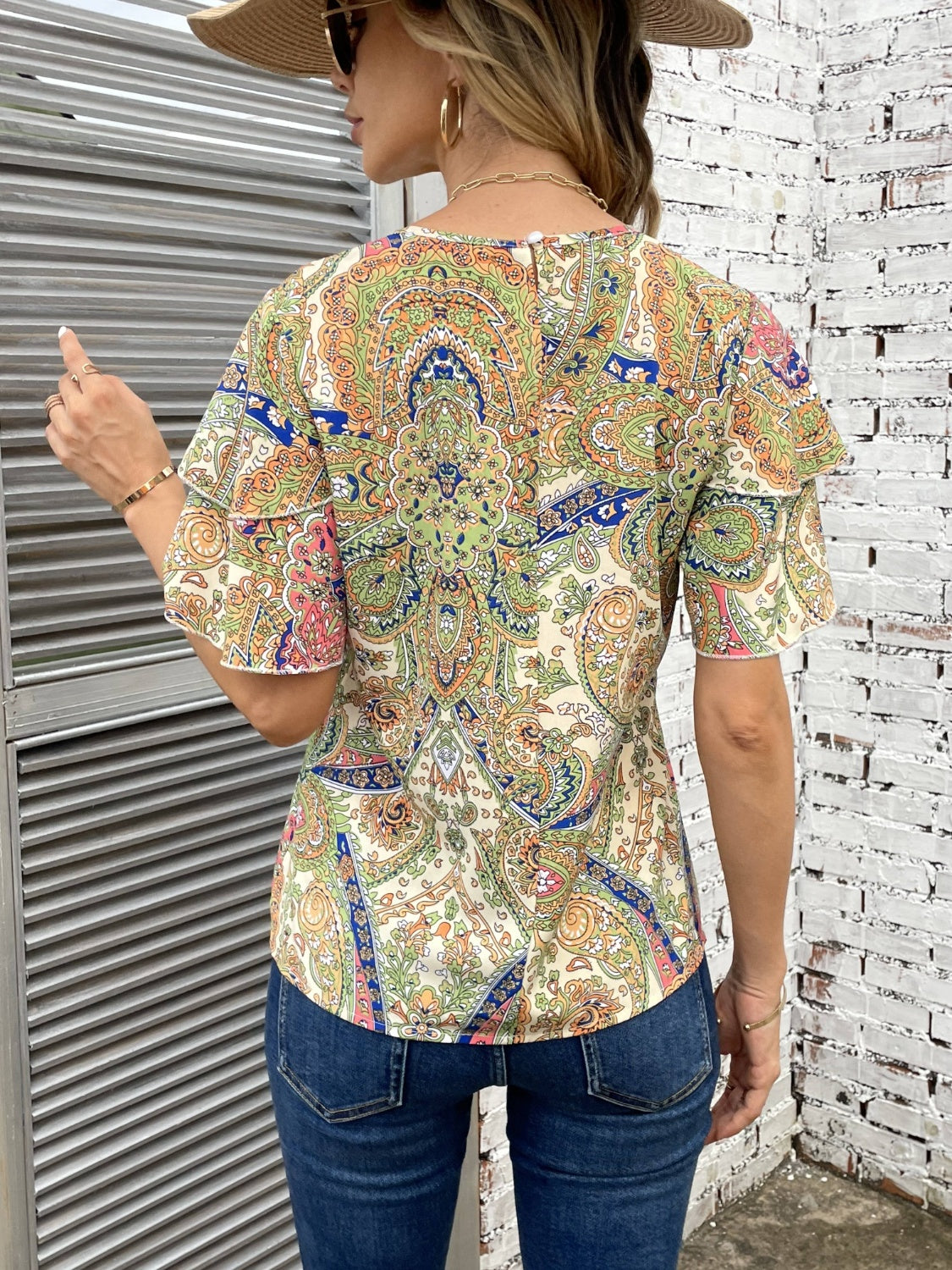 Printed Round Neck Short Sleeve Blouse
Features: Ruffled
Sheer: Opaque
Stretch: No stretch
Material composition: 100% polyester
Care instructions: Machine wash cold. Tumble dry low.
Imported


Size
US
ToDalilly Designs BoutiquePrinted Round Neck Short Sleeve Blouse