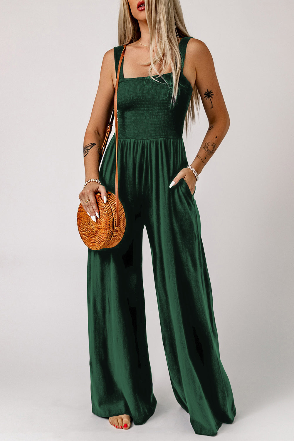 Black Smocked Sleeveless Wide Leg Jumpsuit with Pockets


		This shirred jumpsuit fits most body shapes with elasticity
	
	
		Featured with a square neckline, sleeveless, ruched waist, wide leg, and side pocket
	
BottomsDalilly Designs BoutiqueBlack Smocked Sleeveless Wide Leg Jumpsuit