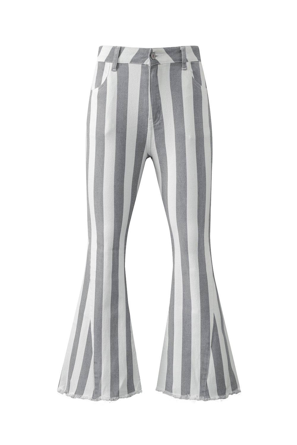 Stripe Star Embellished Western Flare Jeans

	


		These stylish flared jeans are versatile and eye-catching
	
	
		The high waistline makes your legs look longer
	
	
		The vertical stripe print creaBottomsDalilly Designs BoutiqueStripe Star Embellished Western Flare Jeans