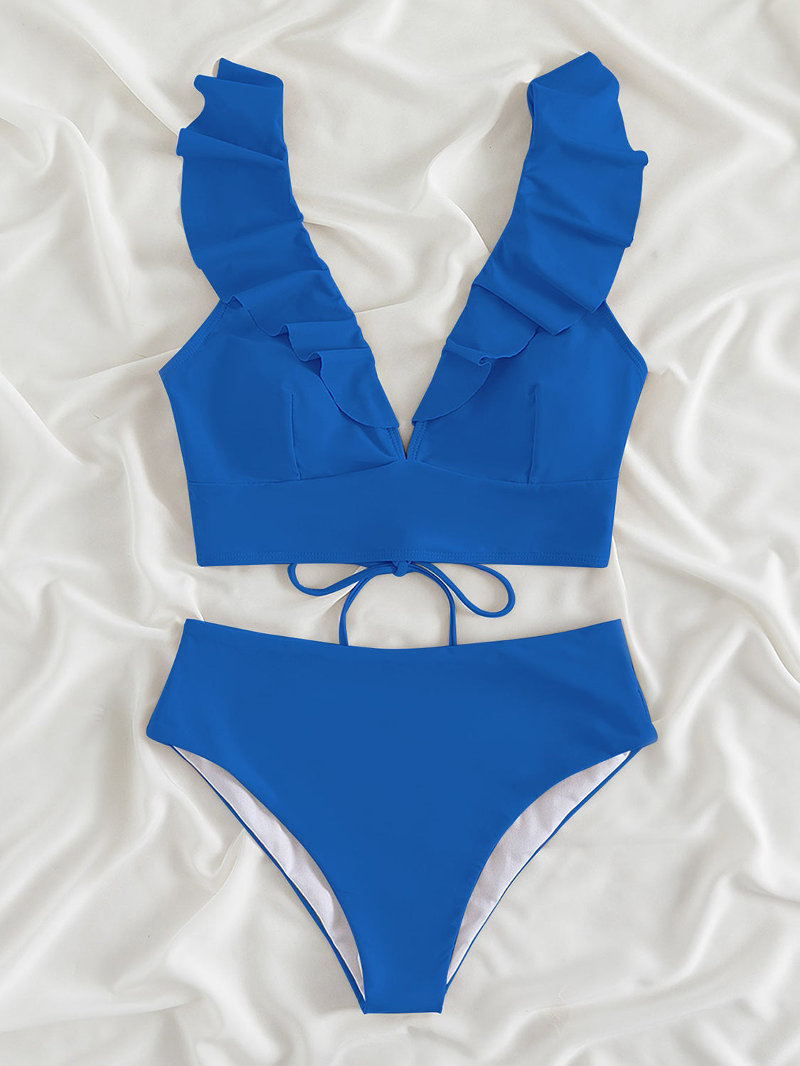 Ruffled V-Neck Sleeveless Two-Piece Swim Set
Features: Ruffled
Number of pieces: Two-piece
Chest pad: Removable padding
Underwire: No underwire
Stretch: Moderate stretch
Material composition: 80% polyamide, 200Dalilly Designs Boutique-Piece Swim Set