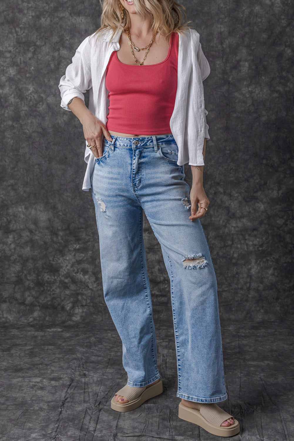 Light Blue High Rise Distressed Straight Leg Jeans

	


		Distressed detailing adds a trendy edge to these high rise jeans
	
	
		The straight leg silhouette creates a flattering and versatile fit, suitable foBottomsDalilly Designs BoutiqueLight Blue High Rise Distressed Straight Leg Jeans