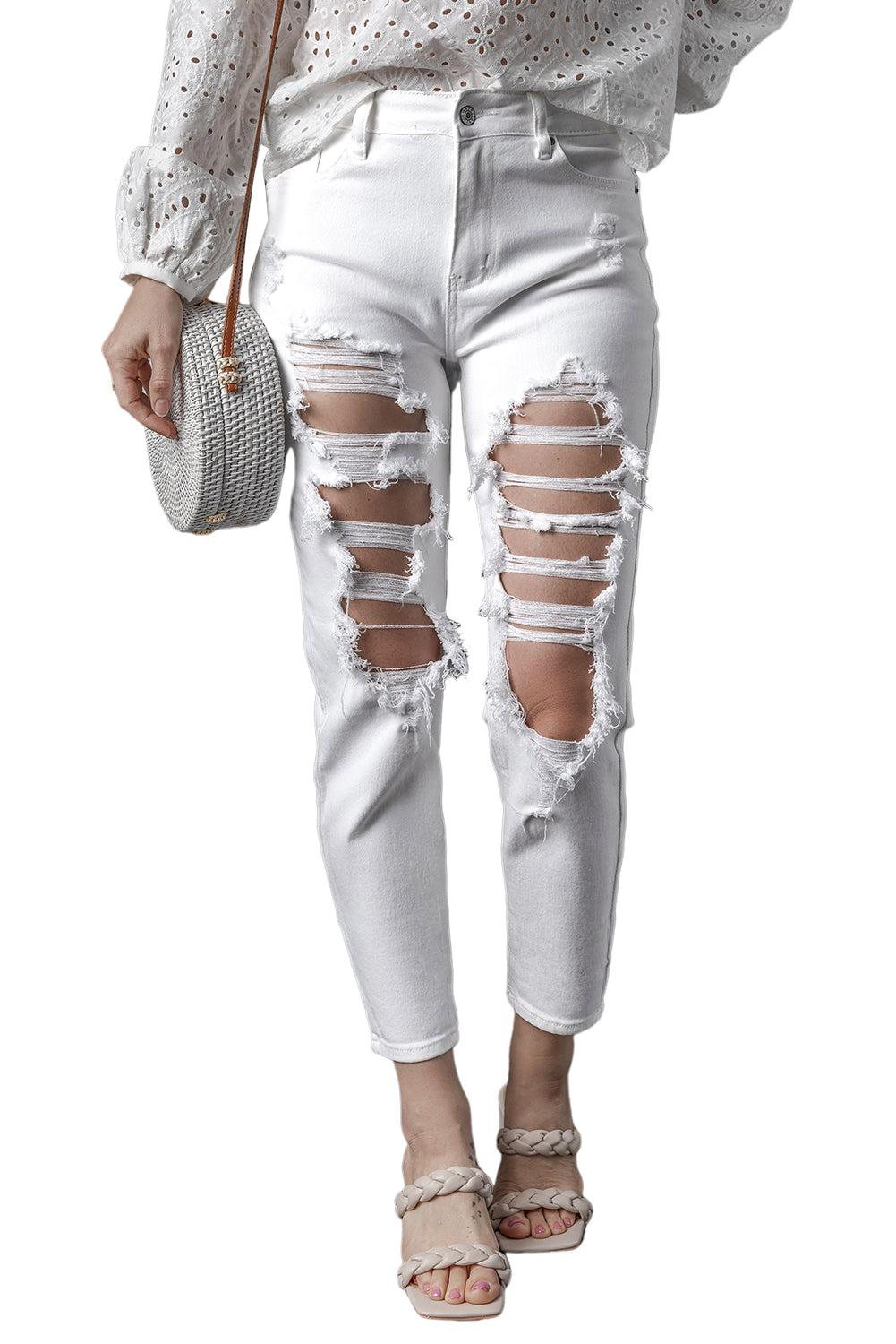 White Distressed Ripped Holes High Waist Skinny Jeans


		The boyfriend jeans are so cool and unique for women
	
	
		Distressed detailing for a trendy and edgy look
	
	
		Slim fit to accentuate your curves and BottomsDalilly Designs BoutiqueWhite Distressed Ripped Holes High Waist Skinny Jeans