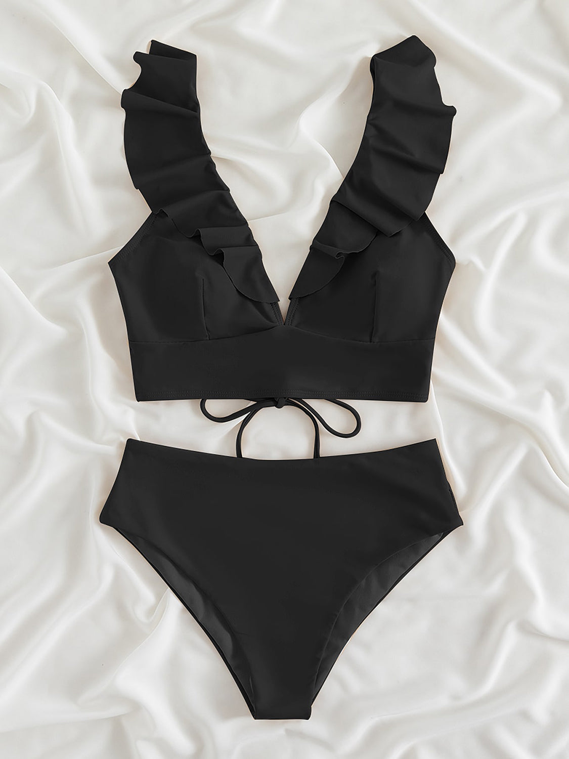 Ruffled V-Neck Sleeveless Two-Piece Swim Set
Features: Ruffled
Number of pieces: Two-piece
Chest pad: Removable padding
Underwire: No underwire
Stretch: Moderate stretch
Material composition: 80% polyamide, 200Dalilly Designs Boutique-Piece Swim Set