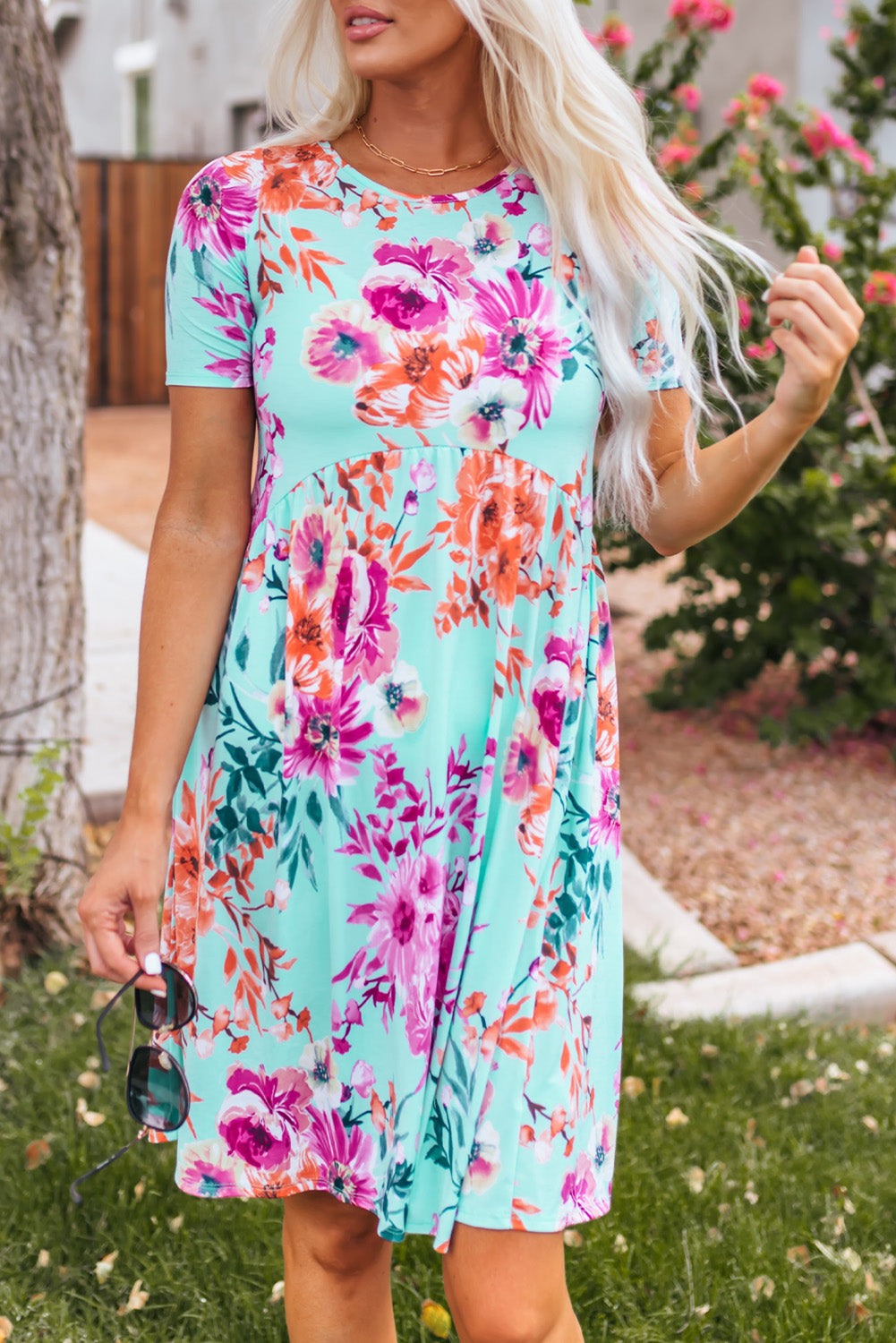 Sky Blue Short Sleeve High Waist Floral T-shirt Dress

		This short dress features a gorgeous floral print on a pretty blue background
	The babydoll body elongates and slims the waist
	Round neck, short sleeves, high DressesDalilly Designs BoutiqueSky Blue Short Sleeve High Waist Floral