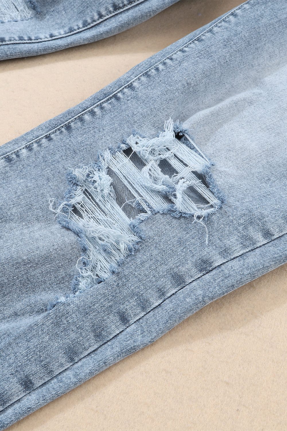 Navy Blue Light Wash Frayed Slim Fit High Waist Jeans


		We highly recommend these trendy light-wash jeans
	
	
		The high waistline paired with a slim fit makes your legs look longer
	
	
		The ripped design isBottomsDalilly Designs BoutiqueNavy Blue Light Wash Frayed Slim Fit High Waist Jeans