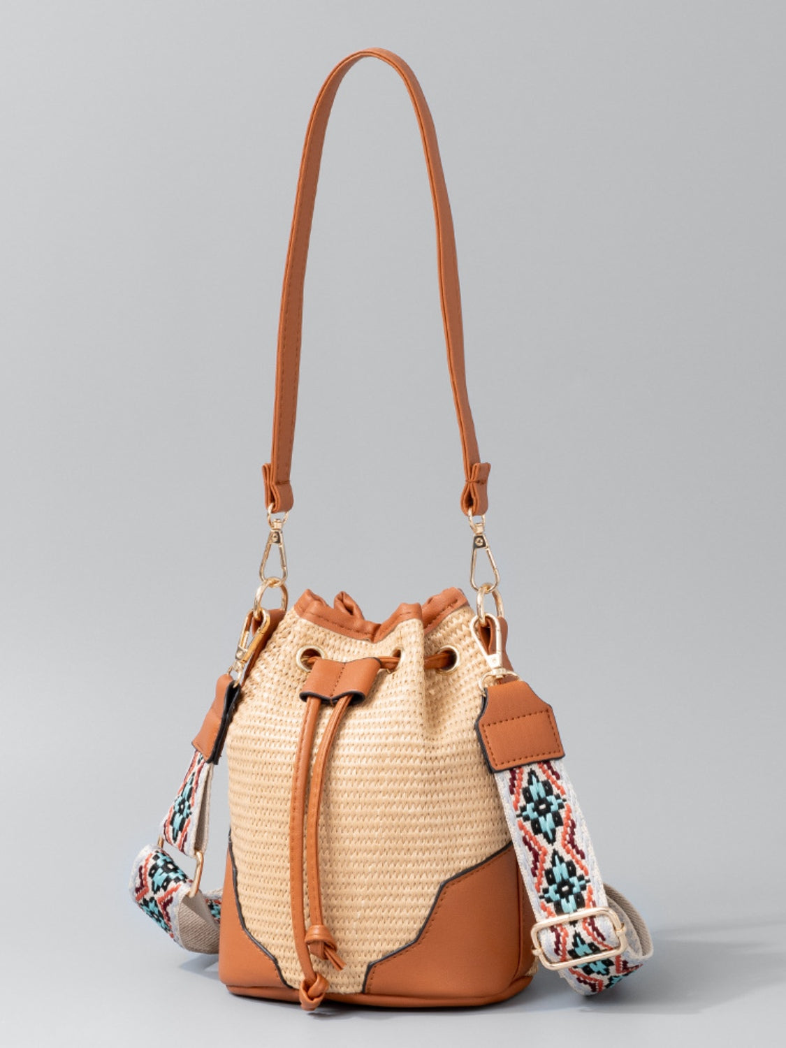 Straw Braided Adjustable Strap Bucket Bag
Bag size: Medium
Material: PU leather, Polyester, Straw
Imported

Product measurements:
One Size: Length 6.9 in, Width 5.1 in, Height 8.7 in, Weight 12.3 oz

Shoes & Bags/HandbagsDalilly Designs BoutiqueStraw Braided Adjustable Strap Bucket Bag