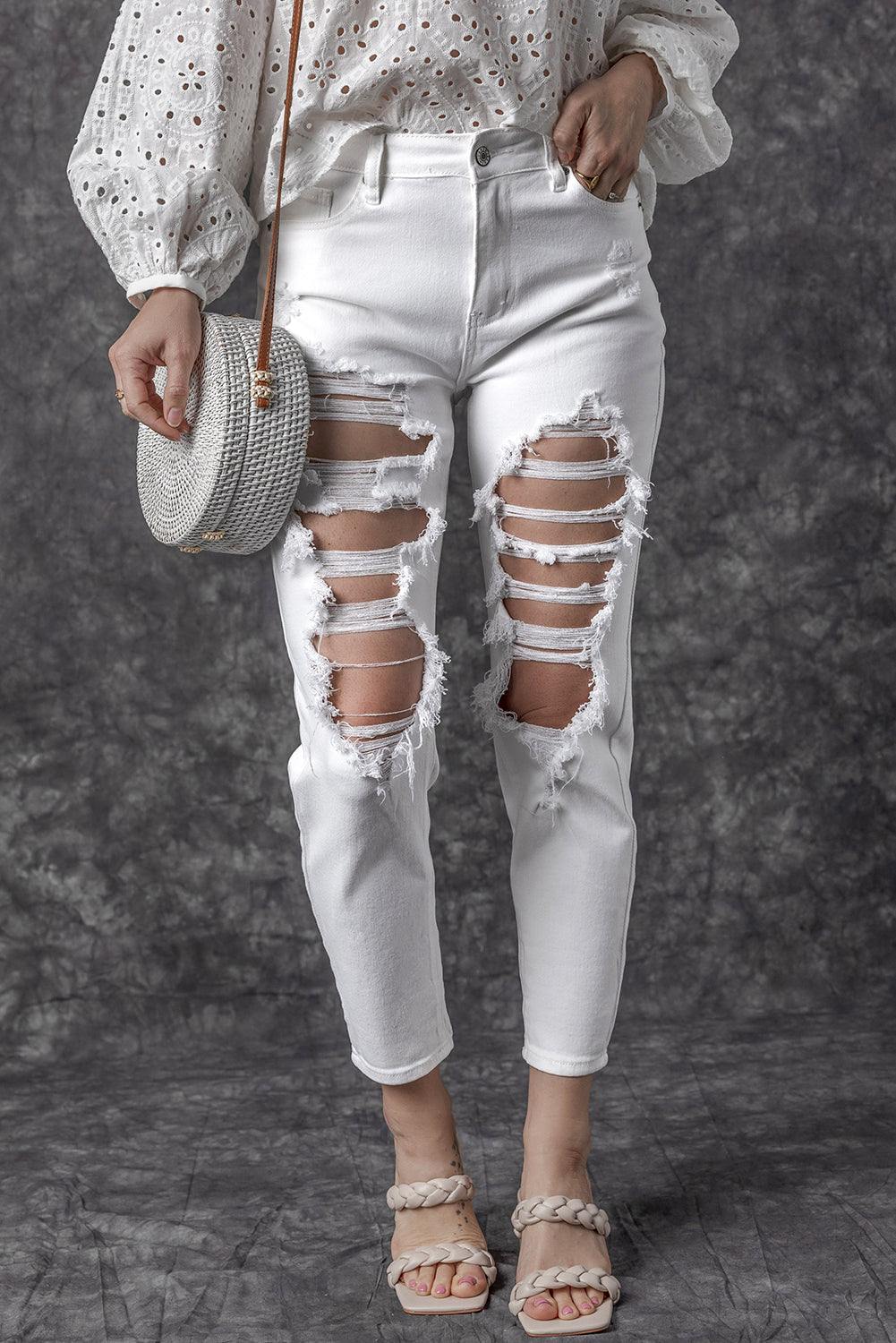 White Distressed Ripped Holes High Waist Skinny Jeans


		The boyfriend jeans are so cool and unique for women
	
	
		Distressed detailing for a trendy and edgy look
	
	
		Slim fit to accentuate your curves and BottomsDalilly Designs BoutiqueWhite Distressed Ripped Holes High Waist Skinny Jeans