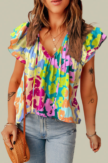 Ruffled Printed Tie Neck Cap Sleeve Blouse
Features: Tied, Ruffled
Sheer: Opaque
Stretch: No stretch
Material composition: 100% polyester
Care instructions: Machine wash cold. Tumble dry low.
Imported


SizeDalilly Designs BoutiqueRuffled Printed Tie Neck Cap Sleeve Blouse