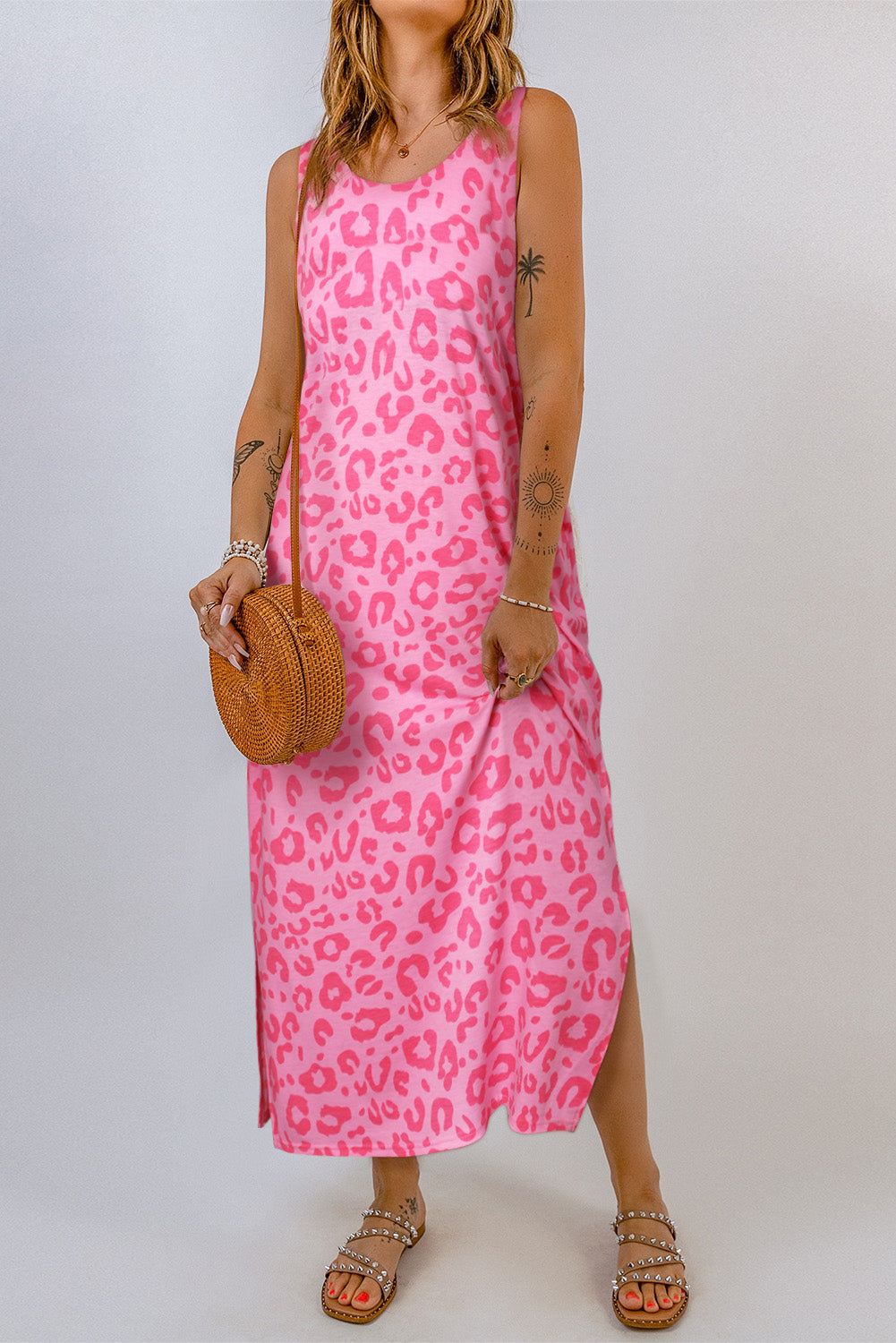 Gray Leopard Print Sleeveless Maxi Dress

	The Leopard Print Sleeveless Maxi Dress is a stylish and versatile piece that can be dressed up or down depending on the occasion
	Made from a lightweight and brDressesDalilly Designs BoutiqueGray Leopard Print Sleeveless Maxi Dress