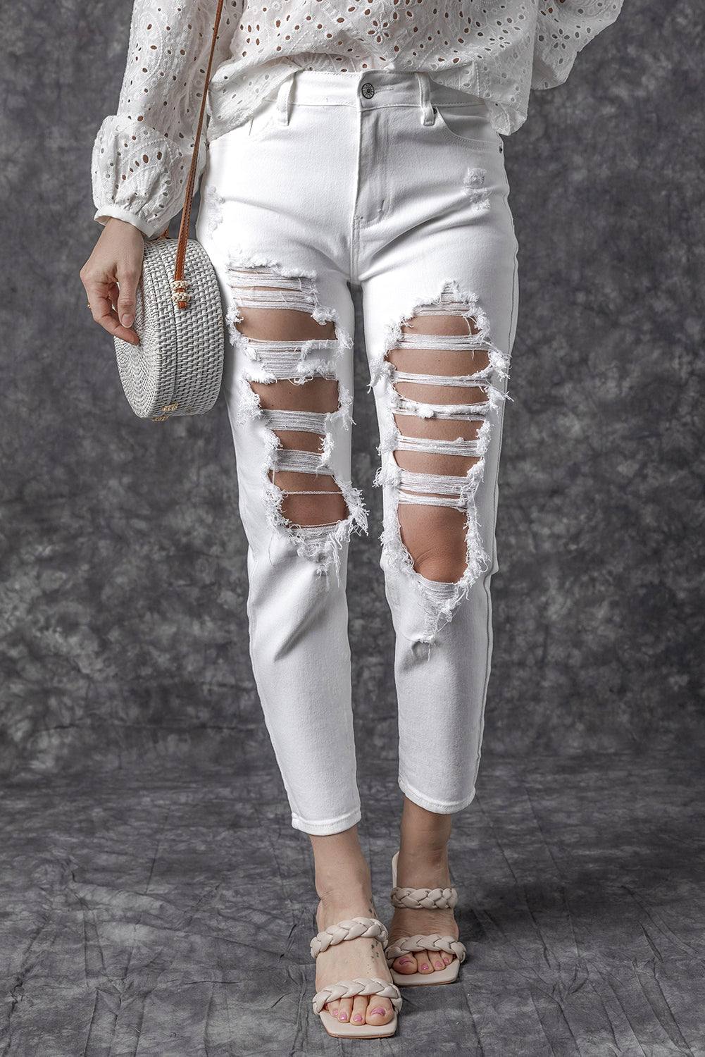 White Distressed Ripped Holes High Waist Skinny Jeans


		The boyfriend jeans are so cool and unique for women
	
	
		Distressed detailing for a trendy and edgy look
	
	
		Slim fit to accentuate your curves and BottomsDalilly Designs BoutiqueWhite Distressed Ripped Holes High Waist Skinny Jeans