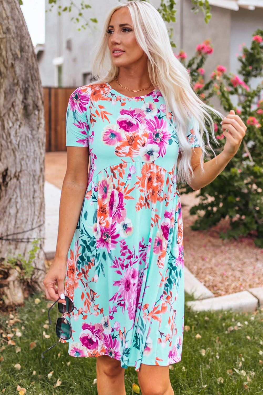 Sky Blue Short Sleeve High Waist Floral T-shirt Dress

		This short dress features a gorgeous floral print on a pretty blue background
	The babydoll body elongates and slims the waist
	Round neck, short sleeves, high DressesDalilly Designs BoutiqueSky Blue Short Sleeve High Waist Floral