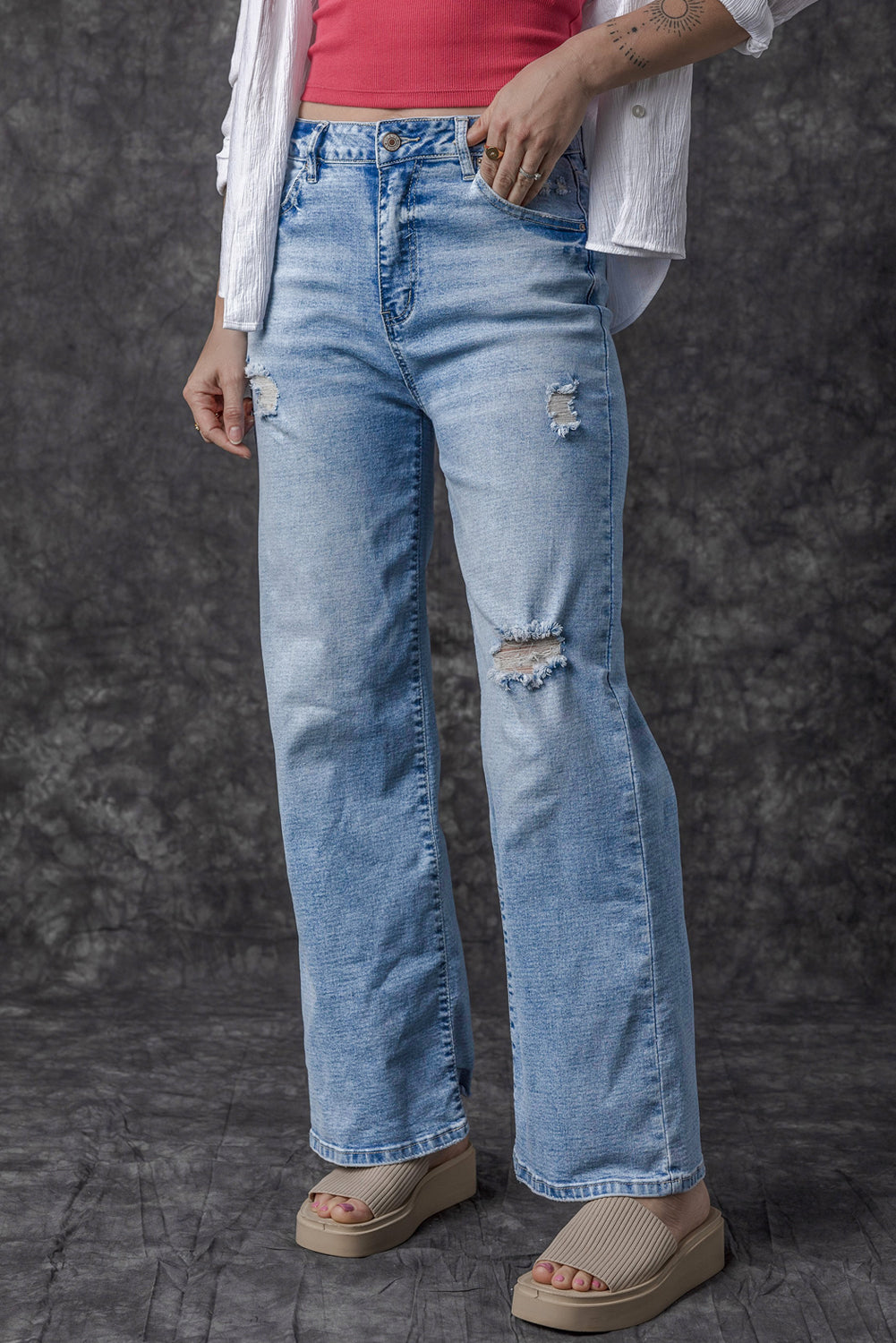 Light Blue High Rise Distressed Straight Leg Jeans

	


		Distressed detailing adds a trendy edge to these high rise jeans
	
	
		The straight leg silhouette creates a flattering and versatile fit, suitable foBottomsDalilly Designs BoutiqueLight Blue High Rise Distressed Straight Leg Jeans