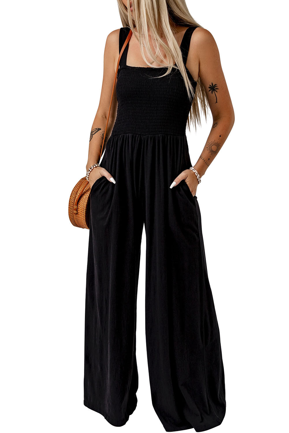 Black Smocked Sleeveless Wide Leg Jumpsuit with Pockets


		This shirred jumpsuit fits most body shapes with elasticity
	
	
		Featured with a square neckline, sleeveless, ruched waist, wide leg, and side pocket
	
BottomsDalilly Designs BoutiqueBlack Smocked Sleeveless Wide Leg Jumpsuit