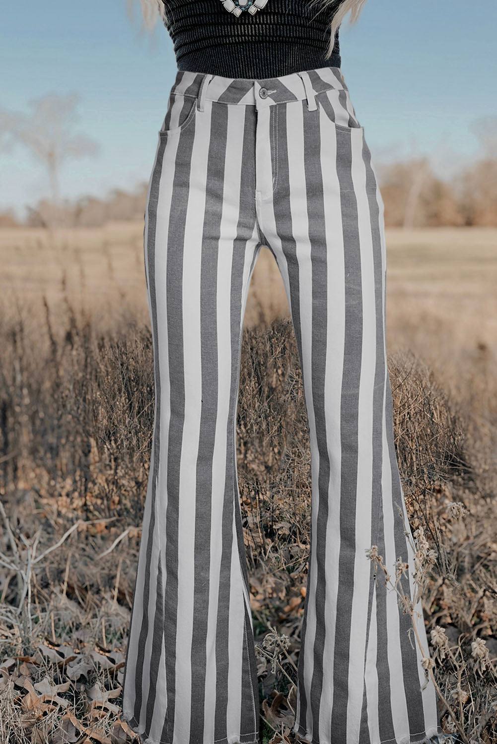 Stripe Star Embellished Western Flare Jeans

	


		These stylish flared jeans are versatile and eye-catching
	
	
		The high waistline makes your legs look longer
	
	
		The vertical stripe print creaBottomsDalilly Designs BoutiqueStripe Star Embellished Western Flare Jeans