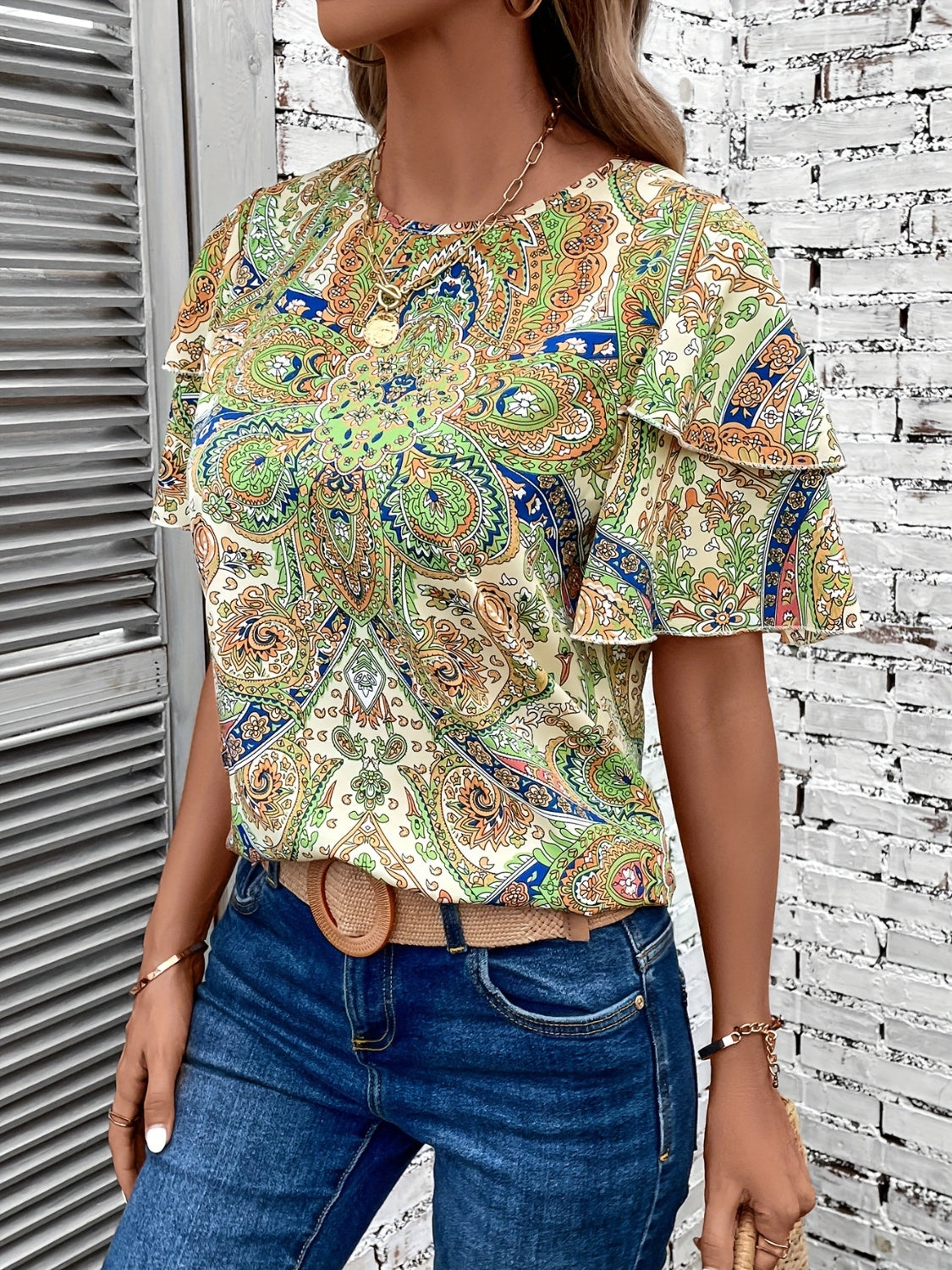 Printed Round Neck Short Sleeve Blouse
Features: Ruffled
Sheer: Opaque
Stretch: No stretch
Material composition: 100% polyester
Care instructions: Machine wash cold. Tumble dry low.
Imported


Size
US
ToDalilly Designs BoutiquePrinted Round Neck Short Sleeve Blouse