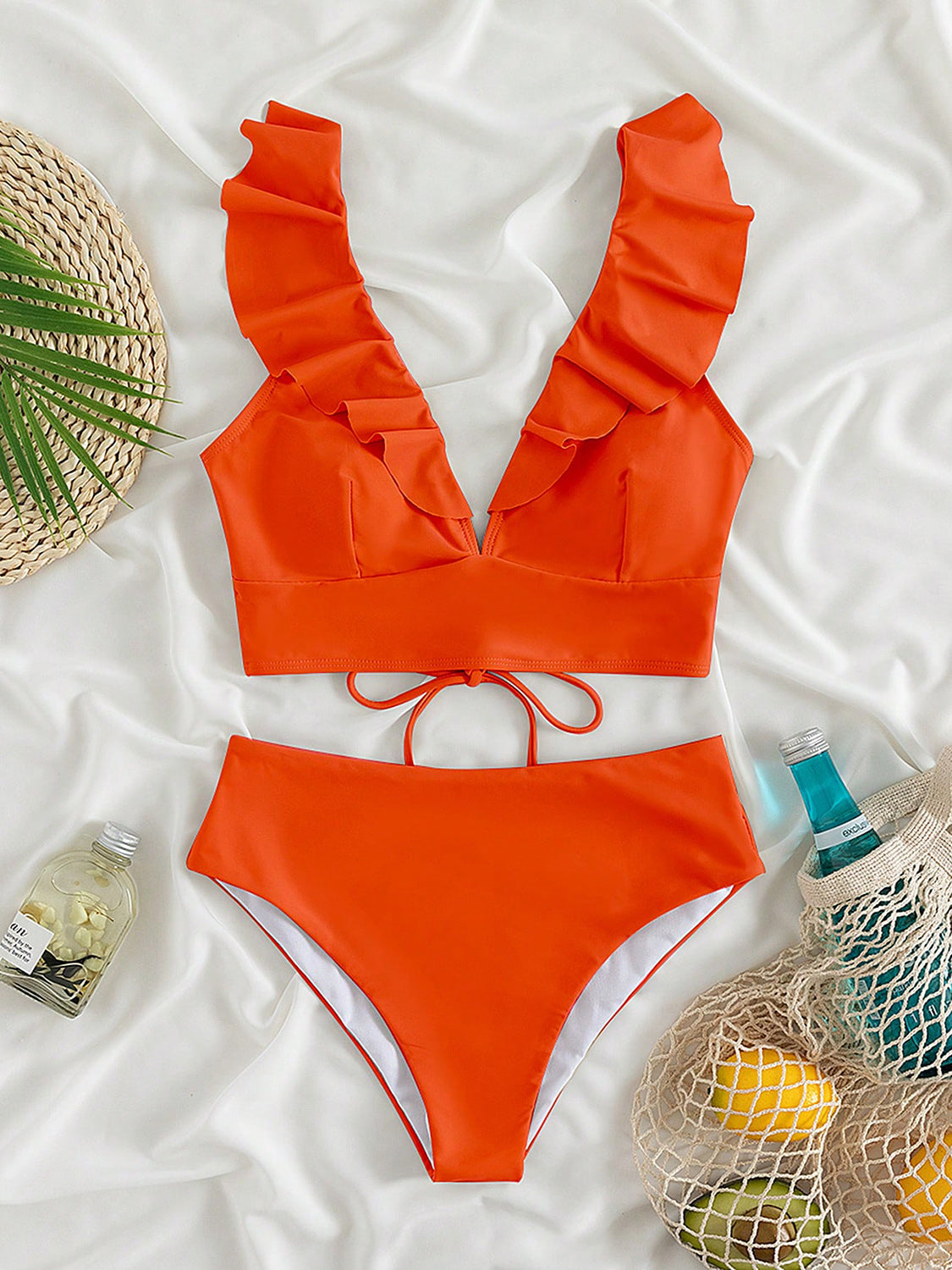 Ruffled V-Neck Sleeveless Two-Piece Swim Set
Features: Ruffled
Number of pieces: Two-piece
Chest pad: Removable padding
Underwire: No underwire
Stretch: Moderate stretch
Material composition: 80% polyamide, 200Dalilly Designs Boutique-Piece Swim Set