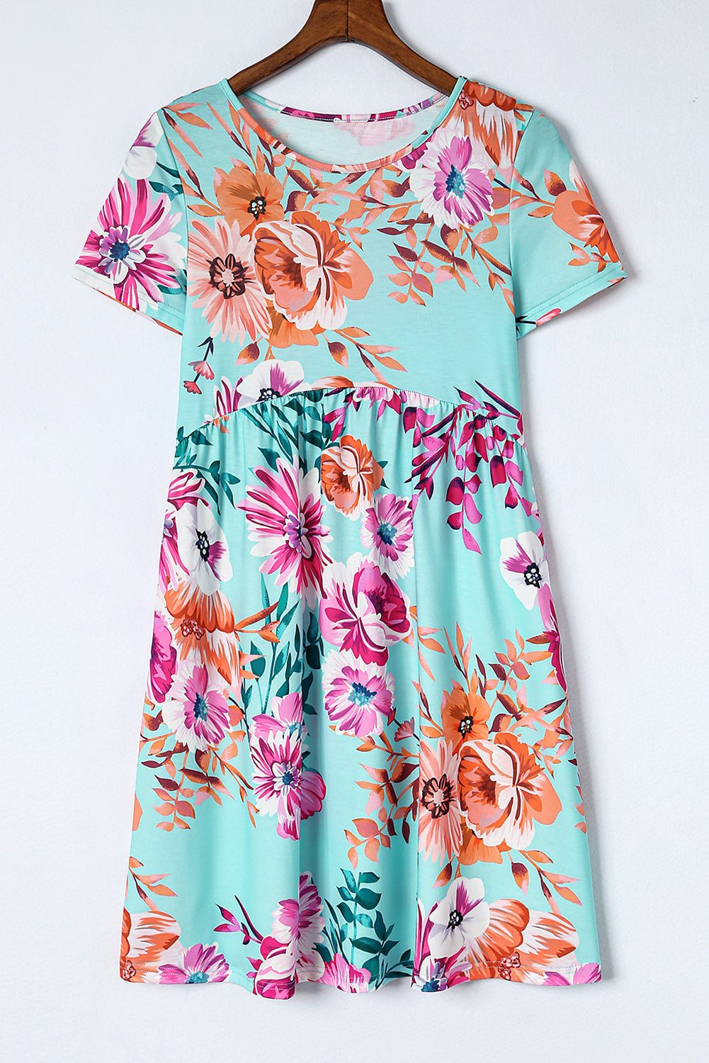 Sky Blue Short Sleeve High Waist Floral T-shirt Dress

		This short dress features a gorgeous floral print on a pretty blue background
	The babydoll body elongates and slims the waist
	Round neck, short sleeves, high DressesDalilly Designs BoutiqueSky Blue Short Sleeve High Waist Floral