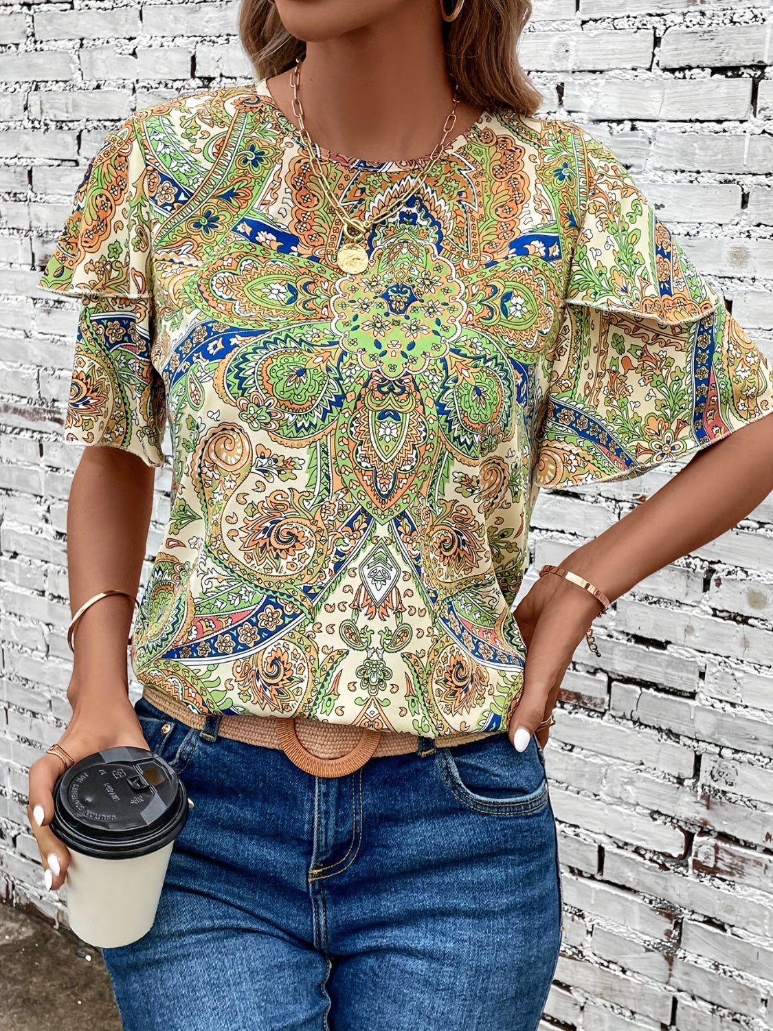 Printed Round Neck Short Sleeve Blouse
Features: Ruffled
Sheer: Opaque
Stretch: No stretch
Material composition: 100% polyester
Care instructions: Machine wash cold. Tumble dry low.
Imported


Size
US
ToDalilly Designs BoutiquePrinted Round Neck Short Sleeve Blouse