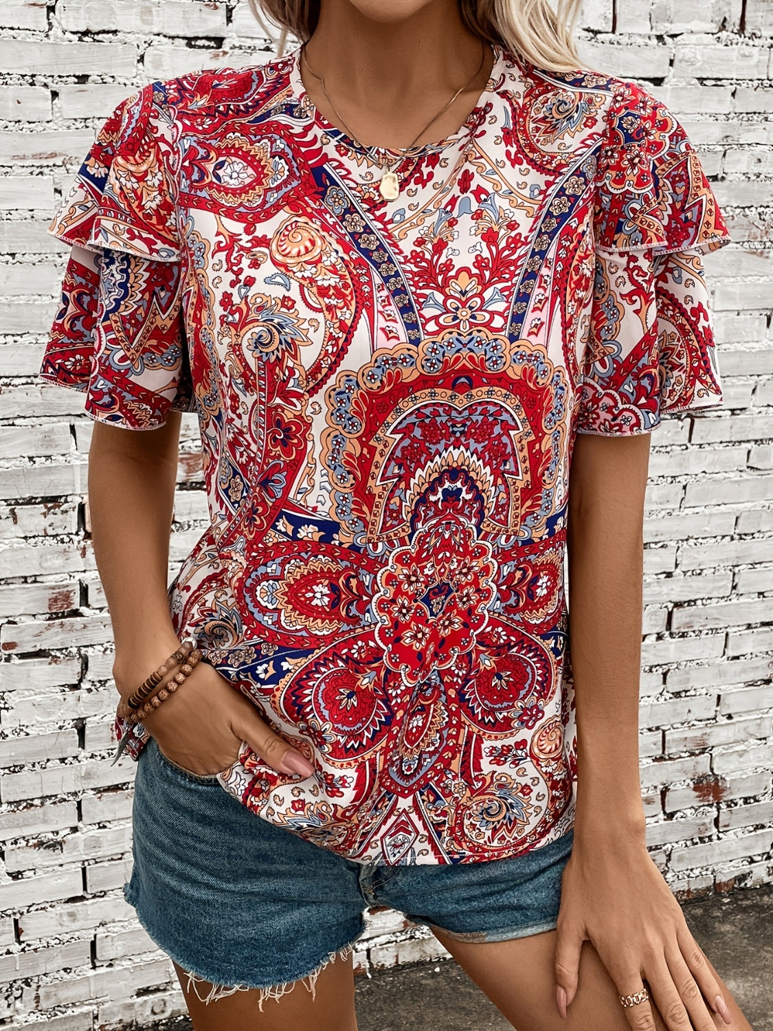 Printed Round Neck Short Sleeve Blouse
Features: Ruffled
Sheer: Opaque
Stretch: No stretch
Material composition: 100% polyester
Care instructions: Machine wash cold. Tumble dry low.
Imported


Size
US
ToDalilly Designs BoutiquePrinted Round Neck Short Sleeve Blouse