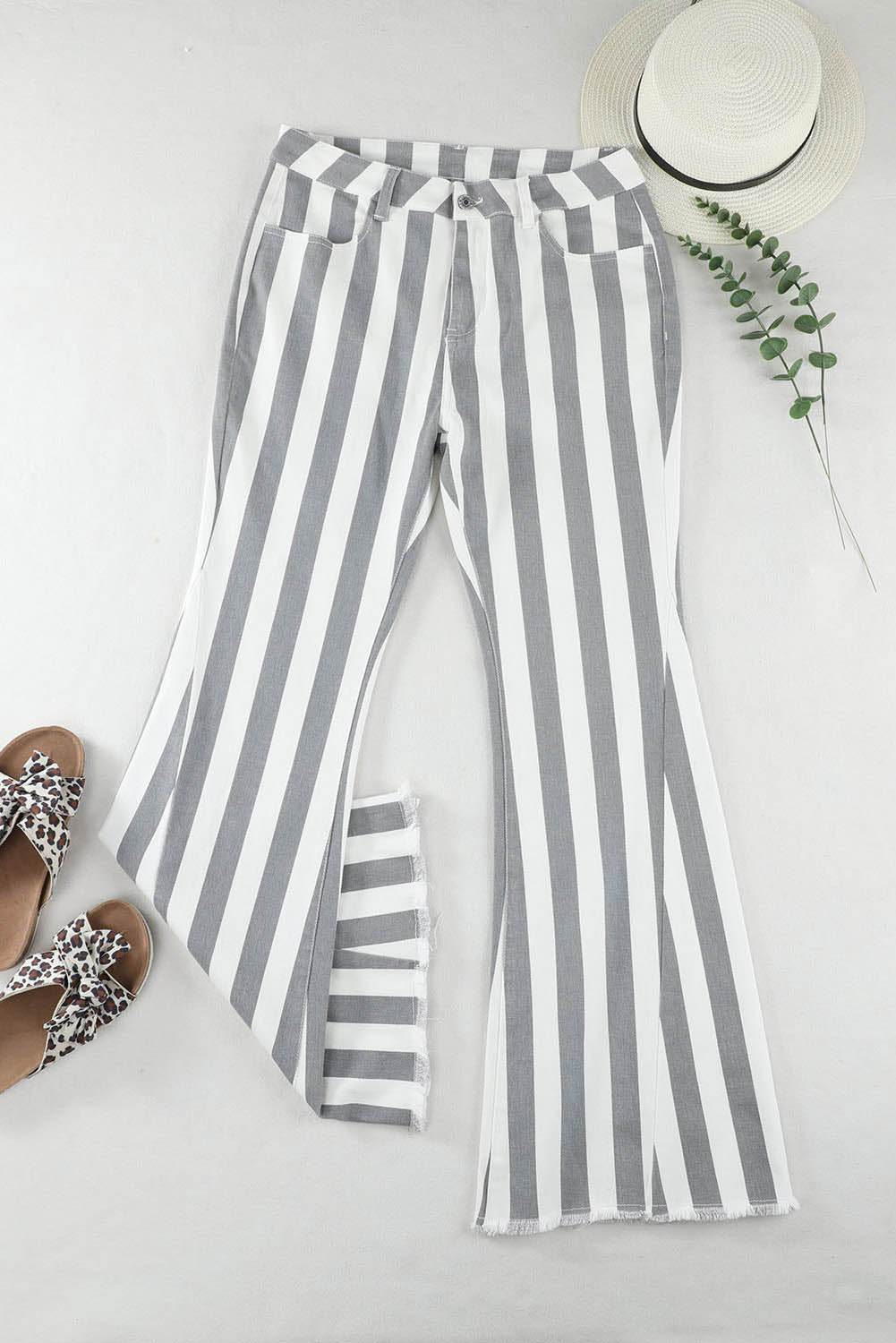 Stripe Star Embellished Western Flare Jeans

	


		These stylish flared jeans are versatile and eye-catching
	
	
		The high waistline makes your legs look longer
	
	
		The vertical stripe print creaBottomsDalilly Designs BoutiqueStripe Star Embellished Western Flare Jeans