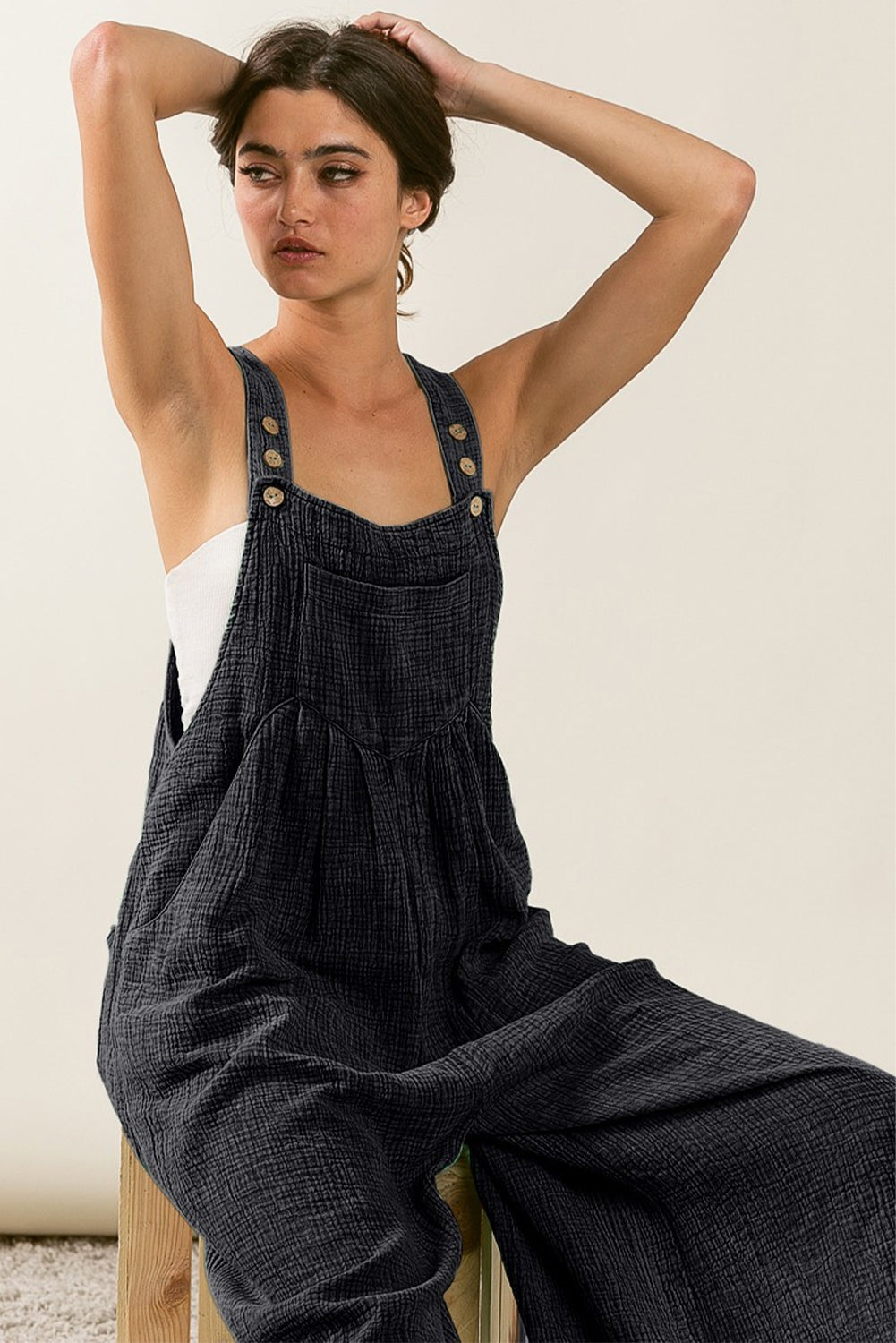 Black Textured Wide Leg Overalls

	Make a statement in these fashion-forward overalls
	Featuring a textured fabric and wide leg silhouette, you'll be comfy all day
	The side and chest pockets desiBottomsDalilly Designs BoutiqueBlack Textured Wide Leg Overalls