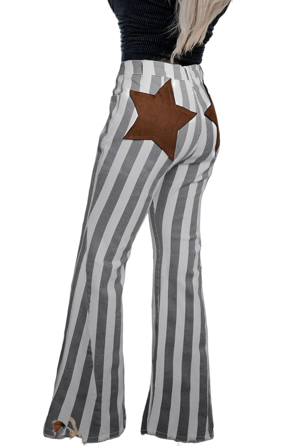 Stripe Star Embellished Western Flare Jeans

	


		These stylish flared jeans are versatile and eye-catching
	
	
		The high waistline makes your legs look longer
	
	
		The vertical stripe print creaBottomsDalilly Designs BoutiqueStripe Star Embellished Western Flare Jeans