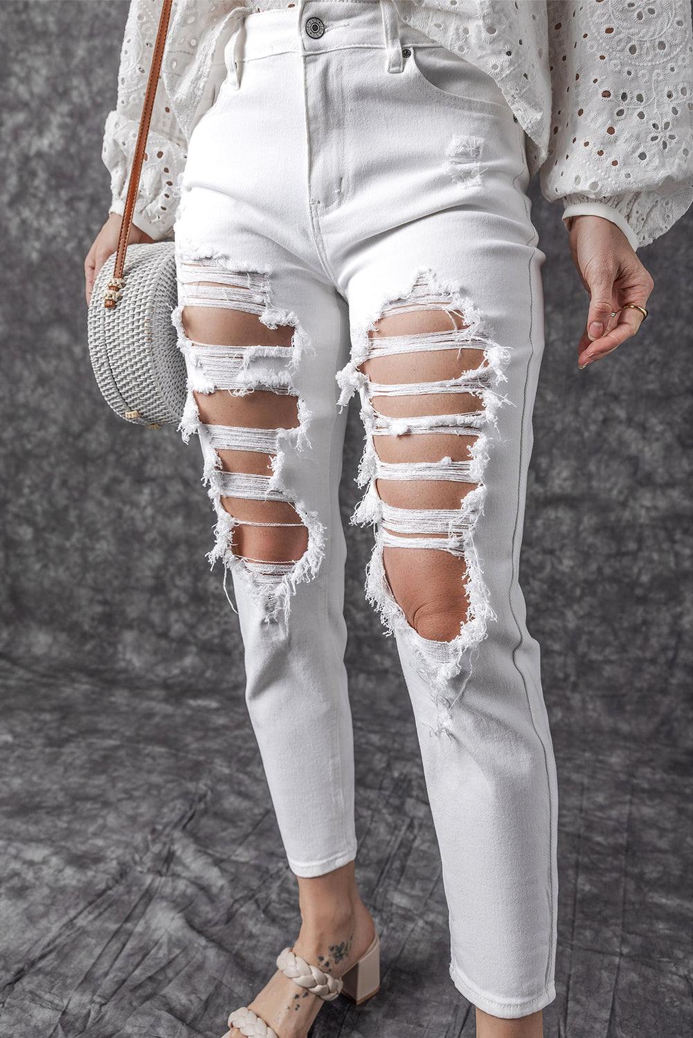 White Distressed Ripped Holes High Waist Skinny Jeans


		The boyfriend jeans are so cool and unique for women
	
	
		Distressed detailing for a trendy and edgy look
	
	
		Slim fit to accentuate your curves and BottomsDalilly Designs BoutiqueWhite Distressed Ripped Holes High Waist Skinny Jeans