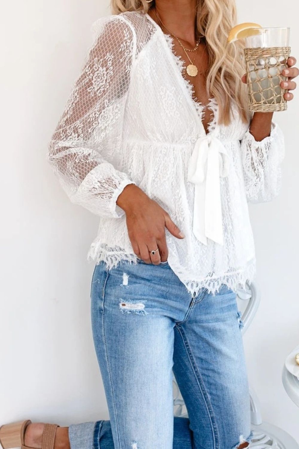 Lace Detail Plunge Long Sleeve Blouse
Features: Lace detail, Tied
Sheer: Semi-sheer
Stretch: No stretch
Material composition: 100% cotton
Care instructions: Machine wash cold. Tumble dry low.
Imported

TopsDalilly Designs BoutiqueLace Detail Plunge Long Sleeve Blouse