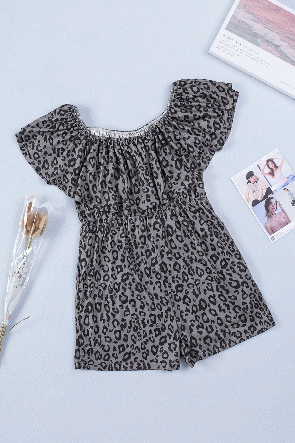 Leopard Off-Shoulder Romper with Pockets


		This ladies’ romper is classic and wild with animal print all over
	
	
		Off-shoulder design with elastic neckline, overlay bust, tunic waist and shorts boBottomsDalilly Designs Boutique-Shoulder Romper