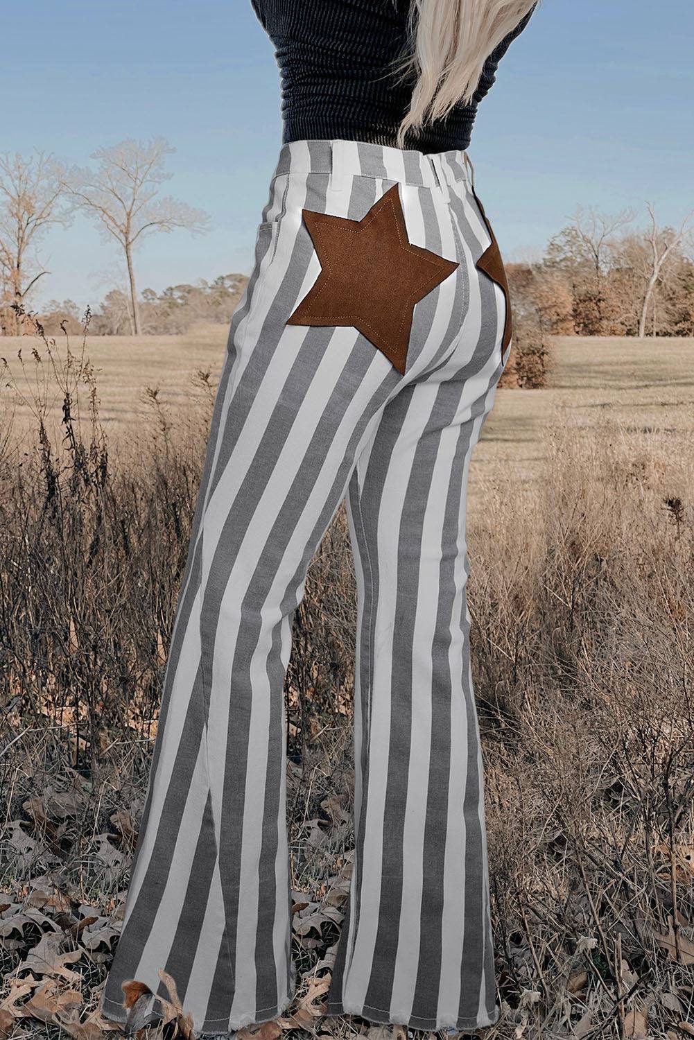 Stripe Star Embellished Western Flare Jeans

	


		These stylish flared jeans are versatile and eye-catching
	
	
		The high waistline makes your legs look longer
	
	
		The vertical stripe print creaBottomsDalilly Designs BoutiqueStripe Star Embellished Western Flare Jeans