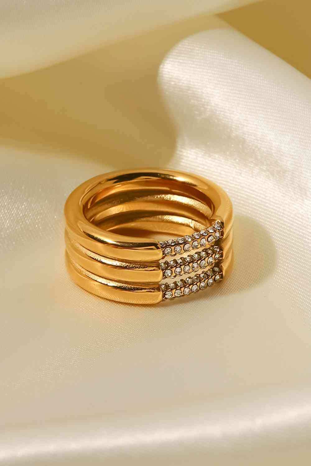 Triple-Layered Rhinestone Ring
Picture style: Flat lay, studio
Features: Triple layered, rhinestone
Material: Stainless steel
Care: Avoid wearing during exercise, as sweat will react with the jewAccessoriesDalilly Designs BoutiqueTriple-Layered Rhinestone Ring