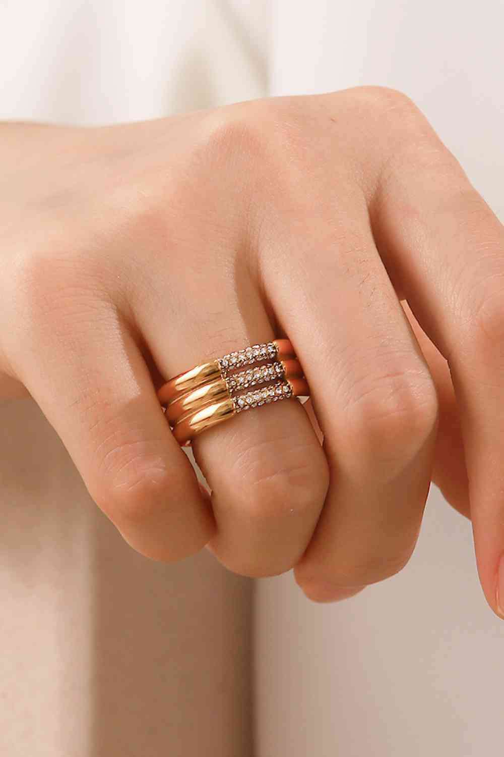 Triple-Layered Rhinestone Ring
Picture style: Flat lay, studio
Features: Triple layered, rhinestone
Material: Stainless steel
Care: Avoid wearing during exercise, as sweat will react with the jewAccessoriesDalilly Designs BoutiqueTriple-Layered Rhinestone Ring