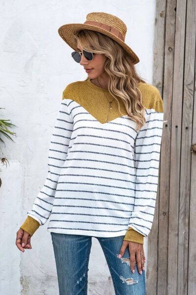 Striped Round Neck Long Sleeve T-Shirt
Features: Basic style
Sheer: Opaque
Stretch: Slightly stretchy
Material composition: 35% polyester, 65% cotton
Care instructions: Machine wash cold. Tumble dry low.TopsDalilly Designs BoutiqueStriped Round Neck Long Sleeve