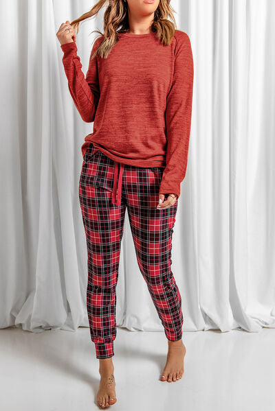 Round Neck Top and Drawstring Plaid Pants Lounge Set
Features: Drawstring
Number of pieces: Two-piece
Sheer: Opaque
Stretch: Slightly stretchy
Material composition: 97% polyester, 3% elastane
Care instructions: MachinLoungewearDalilly Designs BoutiqueDrawstring Plaid Pants Lounge Set