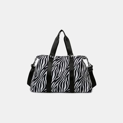 Animal Print Travel Bag
Bag size: Large
Material: Oxford cloth
Imported
Product measurements:One Size:Actual Length 20.1 in, Actual Width 7.9 in, Actual Height 11 in, Weight 14.8 oz
Shoes & BagsDalilly Designs BoutiqueAnimal Print Travel Bag