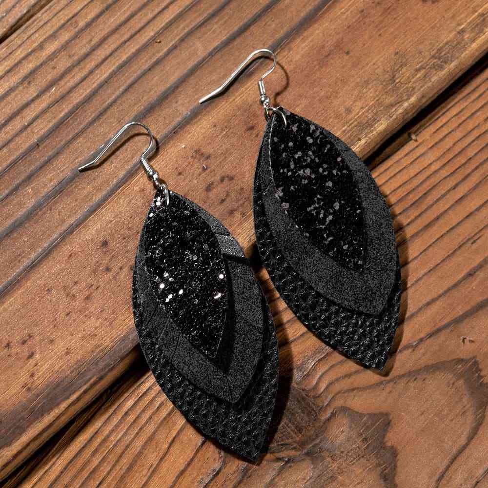 PU Leather Drop Earrings
Material: Alloy, PU
Care instructions: Avoid wearing during exercise, as sweat will react with the jewelry to produce silver chloride and copper sulfide, which causAccessoriesDalilly Designs BoutiquePU Leather Drop Earrings