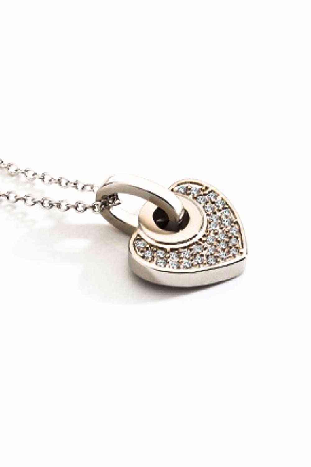 Crystal Heart Pendant Necklace
Picture style: Ghost mannequin
Features: Heart pendant
Material: Copper, crystal
Care: Avoid wearing during exercise, as sweat will react with the jewelry to producAccessoriesDalilly Designs BoutiqueCrystal Heart Pendant Necklace