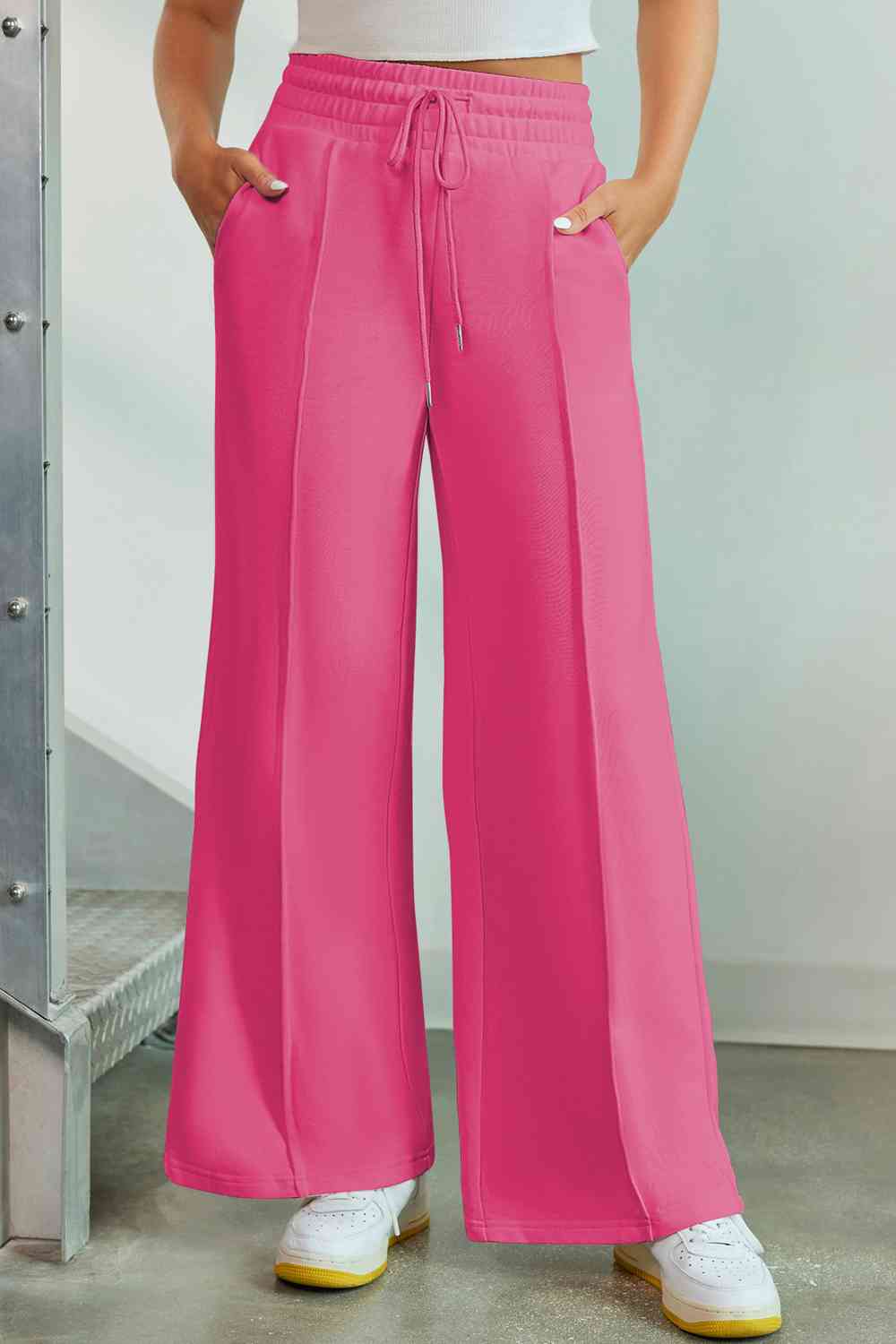 Drawstring Wide Leg Pants with Pockets
Features: Pocketed
Sheer: Opaque
Material composition: 50% polyester, 45% viscose, 5% elastane
Care instructions: Machine wash cold. Tumble dry low.
Imported
ProducDalilly Designs BoutiqueDrawstring Wide Leg Pants