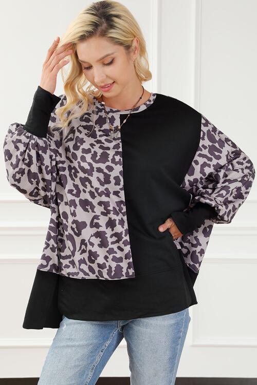 Leopard Round Neck Lantern Sleeve Slit Sweatshirt
Features: Slit
Sheer: Opaque
Stretch: Slightly stretchy
Material composition: 75% polyester, 20% viscose, 5% elastane
Care instructions: Machine wash cold. Tumble dTopsDalilly Designs BoutiqueLeopard Round Neck Lantern Sleeve Slit Sweatshirt