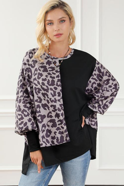 Leopard Round Neck Lantern Sleeve Slit Sweatshirt
Features: Slit
Sheer: Opaque
Stretch: Slightly stretchy
Material composition: 75% polyester, 20% viscose, 5% elastane
Care instructions: Machine wash cold. Tumble dTopsDalilly Designs BoutiqueLeopard Round Neck Lantern Sleeve Slit Sweatshirt