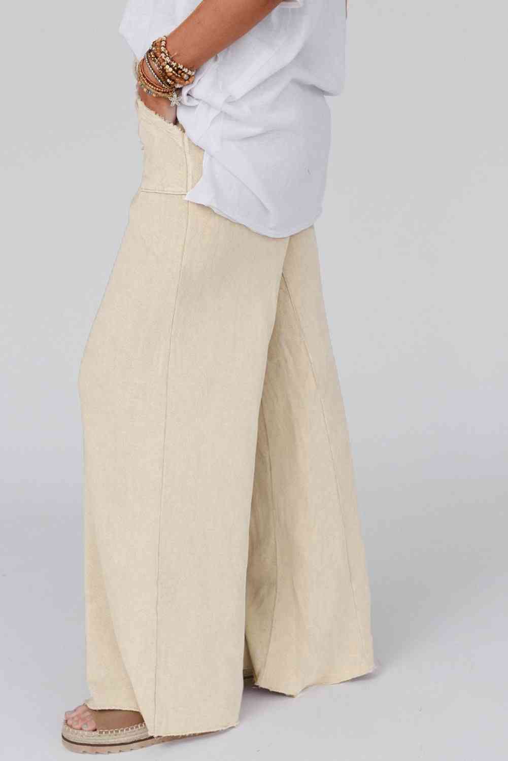 Wide Leg Pocketed Pants
Pattern type: Solid
Style: Casual
Features: Pocketed, Drawstring
Length: Long
Material composition: 80% polyester, 20% cotton
Care instructions: Machine wash cold. BottomsDalilly Designs BoutiqueWide Leg Pocketed Pants