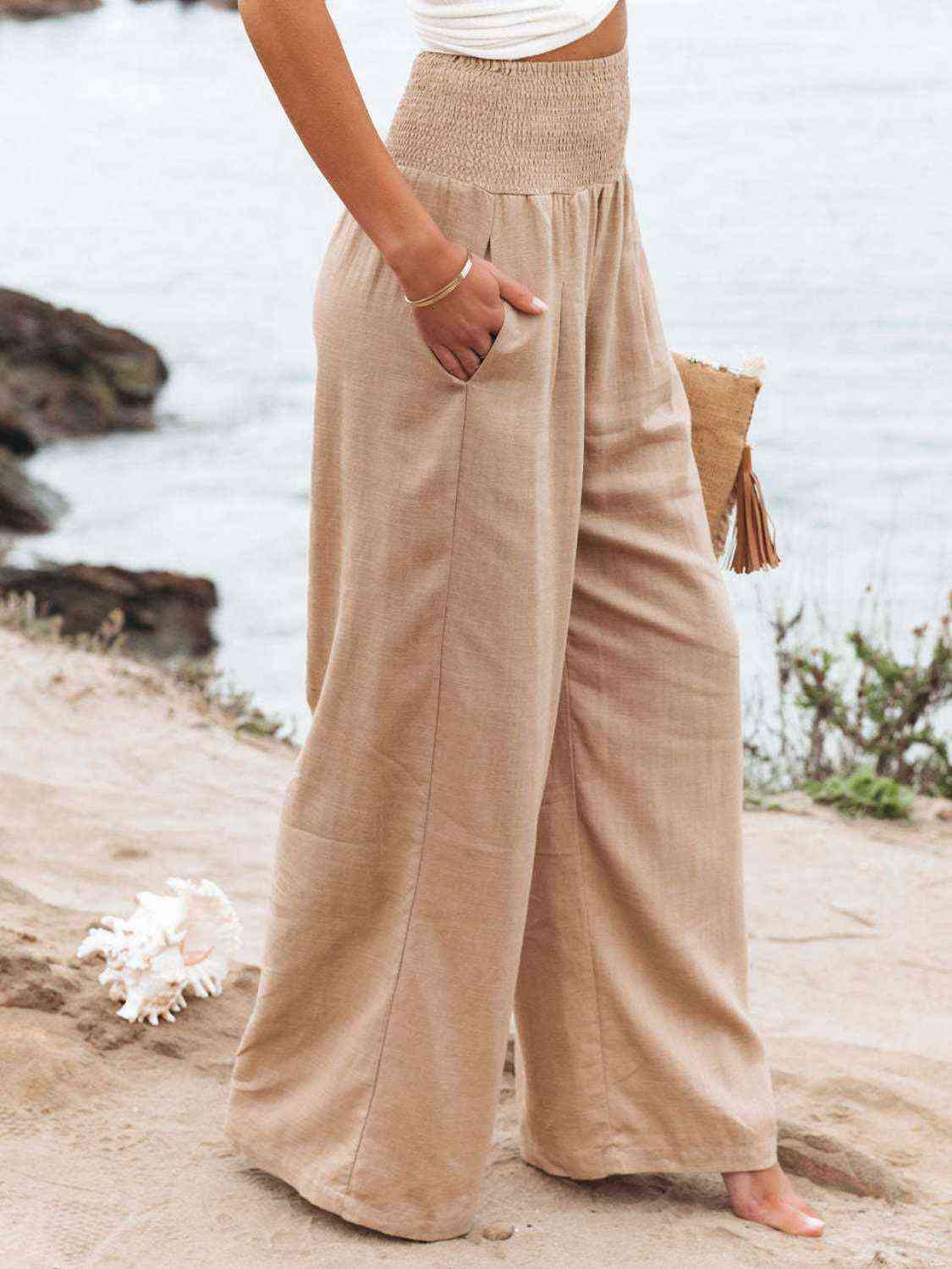 Full Size Smocked Waist Wide Leg Pants
Features: Pocketed, Smocked
Sheer: Opaque
Material composition: 95% polyester, 5%spandex
Care instructions: Machine wash cold. Tumble dry low.
Imported
Product measBottomsDalilly Designs BoutiqueFull Size Smocked Waist Wide Leg Pants