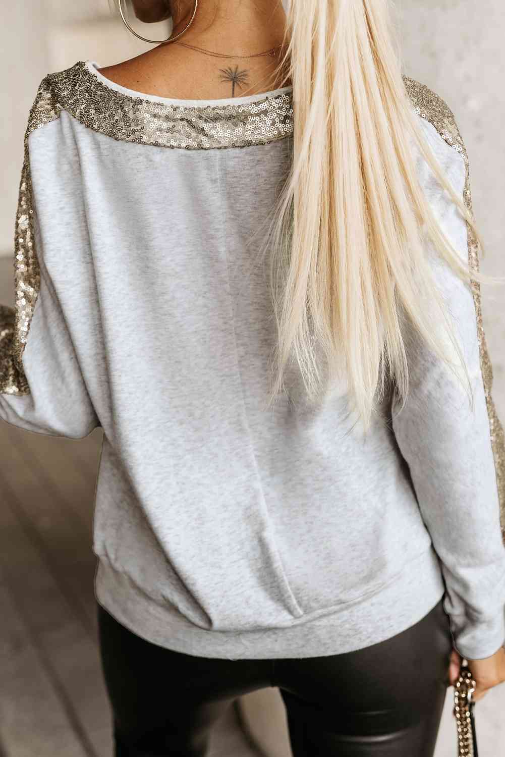 Sequin V-Neck Sweatshirt
Features: Sequin
Sheer: Opaque
Stretch: Slightly stretchy
Material composition: 60% polyester,35% cotton, 5% elastane
Care instructions: Machine wash cold. Tumble dTopsDalilly Designs Boutique-Neck Sweatshirt