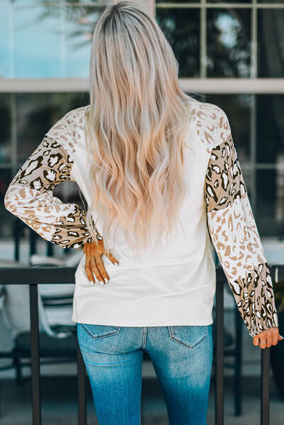 Leopard Round Neck Dropped Shoulder T-Shirt
Features: Basic style
Sheer: Opaque
Stretch: Slightly stretchy
Material composition: 95% polyester, 5% elastane
Care instructions: Machine wash cold. Tumble dry lowTopsDalilly Designs BoutiqueLeopard Round Neck Dropped Shoulder